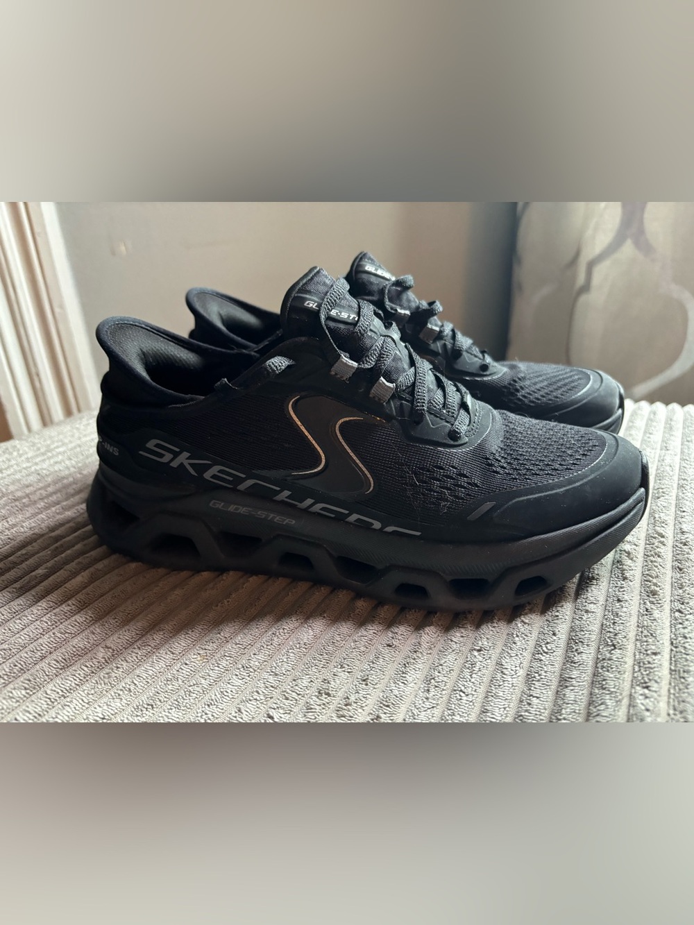 Skechers Women’s Glide-Step Black Athletic Sneakers with Subtle Silver Accent